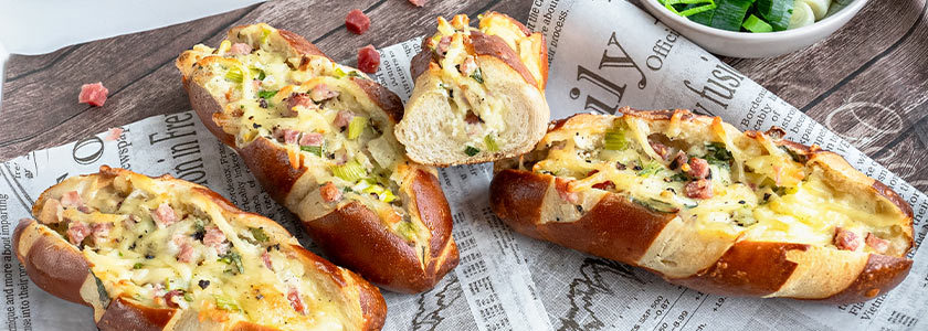 Mini pretzel sticks with leek & sour cream filling