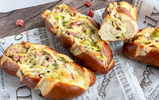 Mini pretzel sticks with leek & sour cream filling